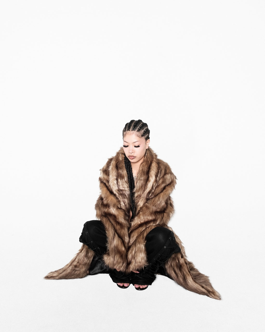 NO MASS PROD. CRUCIFIED FUR COAT