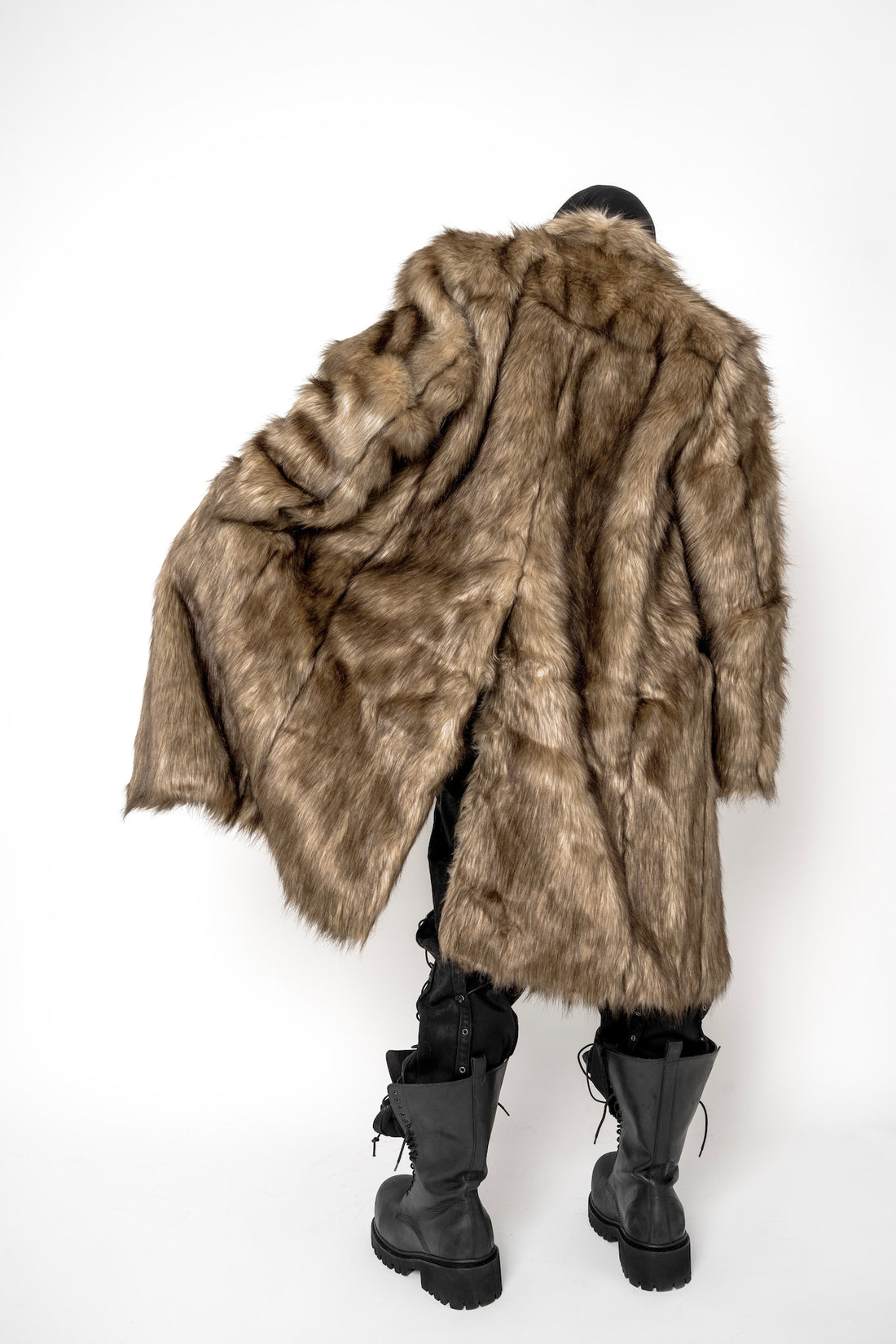 NO MASS PROD. CRUCIFIED FUR COAT